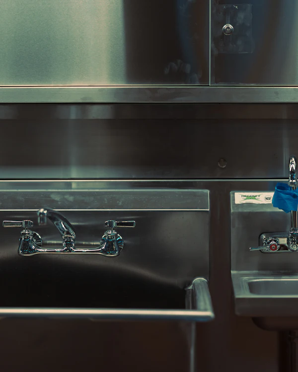 Stainless-steel utility sink and faucets